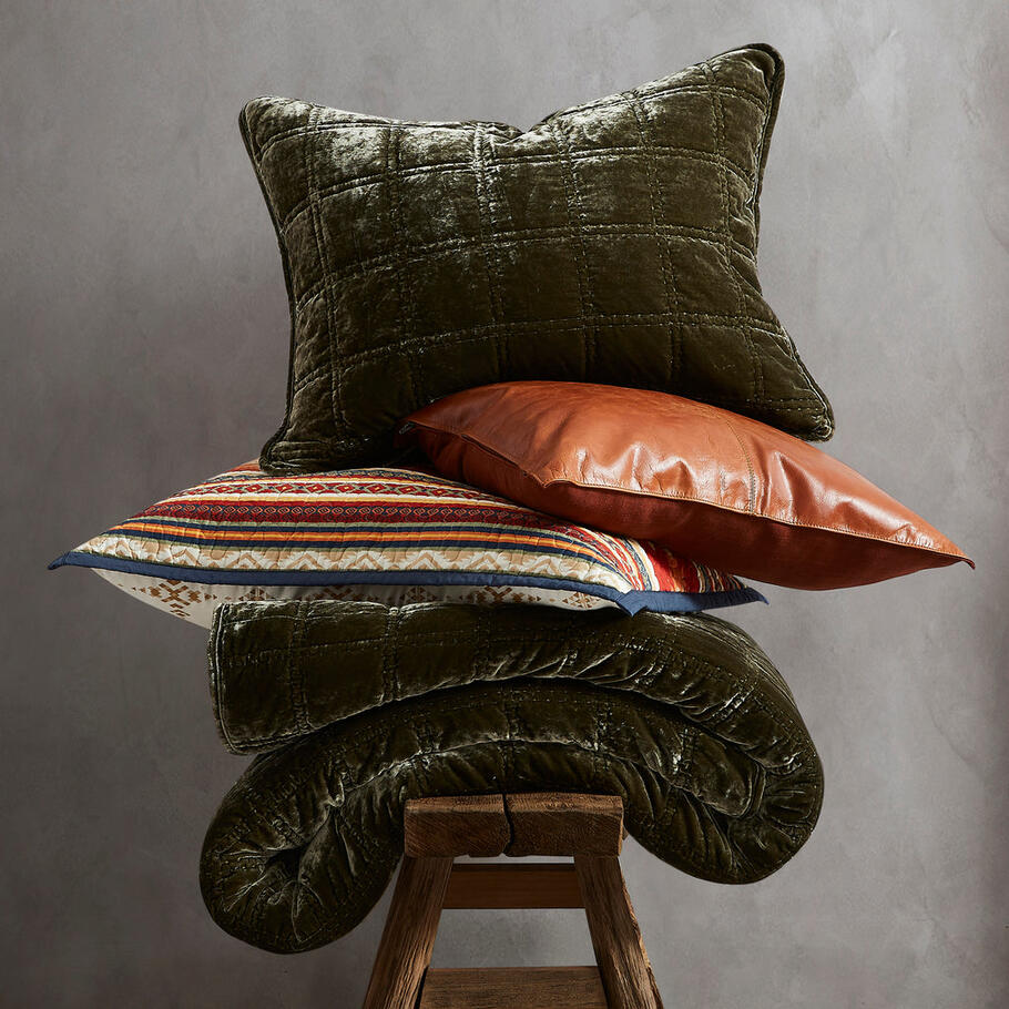 Fern Green Faux Silk Velvet Quilt Set displayed with coordinating pillow shams, highlighting the cohesive design and elegant stitching.