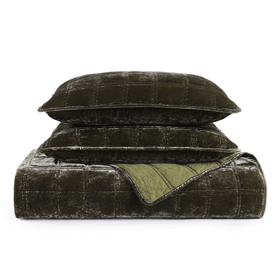 Fern Green Faux Silk Velvet Quilt Set displayed with two pillow shams, highlighting the cohesive design and elegant stitching.