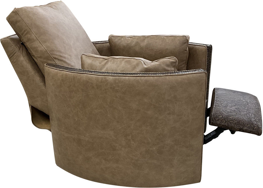 Side view of the Frio River Swivel Recliner, highlighting the Floral Bone Black accent leather and the recliner’s smooth curves and craftsmanship.