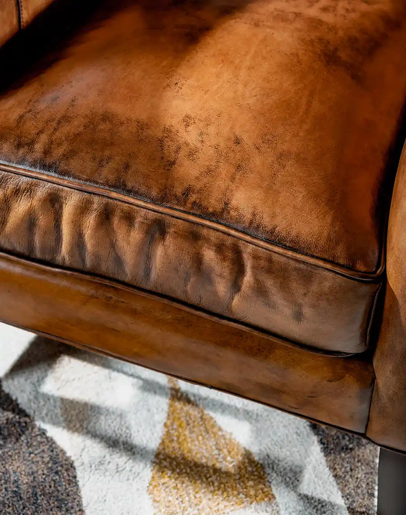 Close-up of the generously cushioned seat, designed for luxurious comfort.