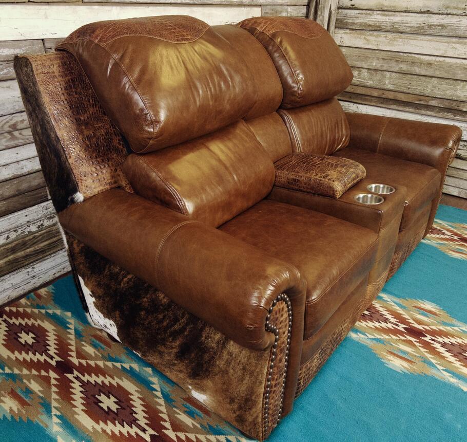 Angled side view of the Giovanni Theater Reclining Love Seat, highlighting its reclining mechanisms and intricate Gator Rustic Cognac leather detailing.
