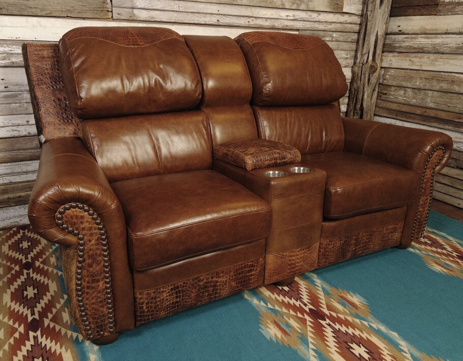 Giovanni Theater Reclining Love Seat showcasing its luxurious light brown leather upholstery, genuine Brazilian cowhide accents, and Western-inspired design.