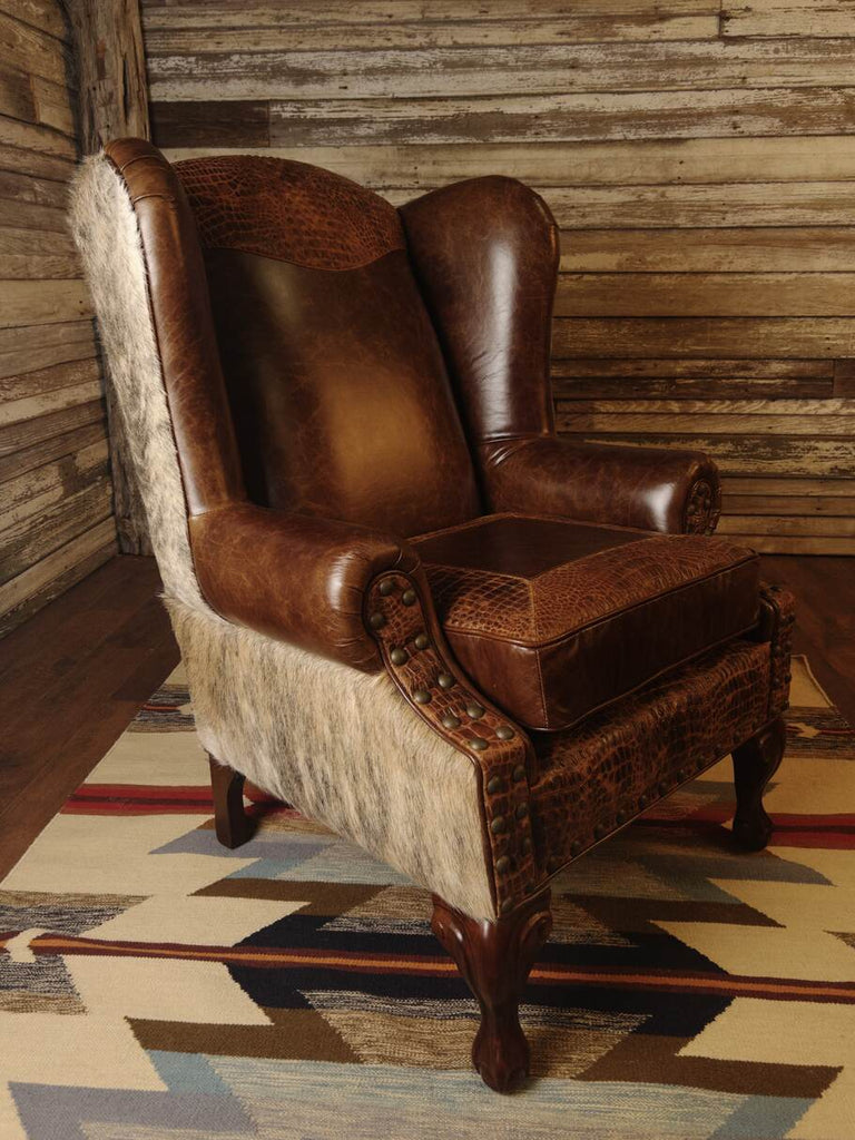Angled perspective of the Giovanni Wingback Chair highlighting the light exotic brindle Brazilian cowhide wrapping the sides and back.