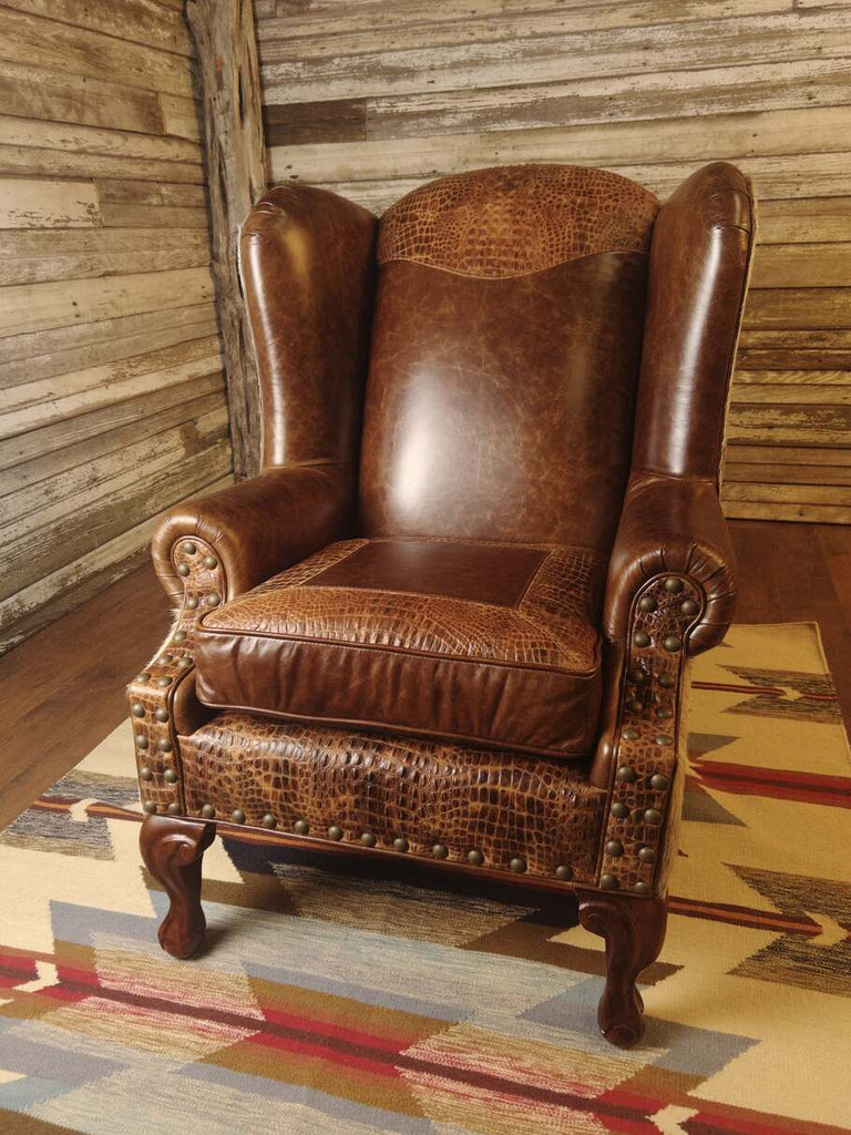 Giovanni Wingback Chair showcasing Giovanni Light Brown leather upholstery with embossed Gator Rustic Cognac accents on the headrest and seat cushion.