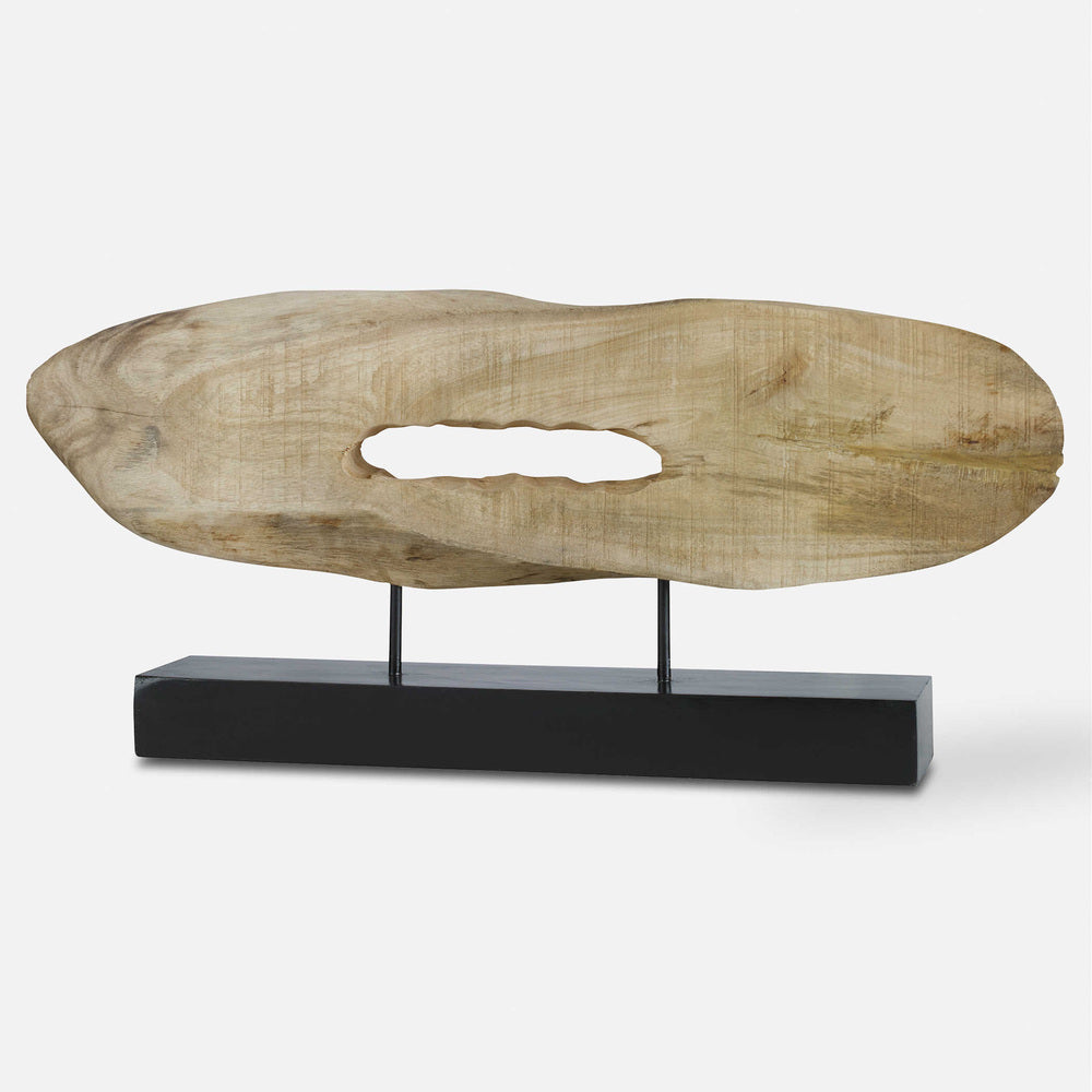 Rustic mango wood log sculpture on a sleek matte black base for elegant display.