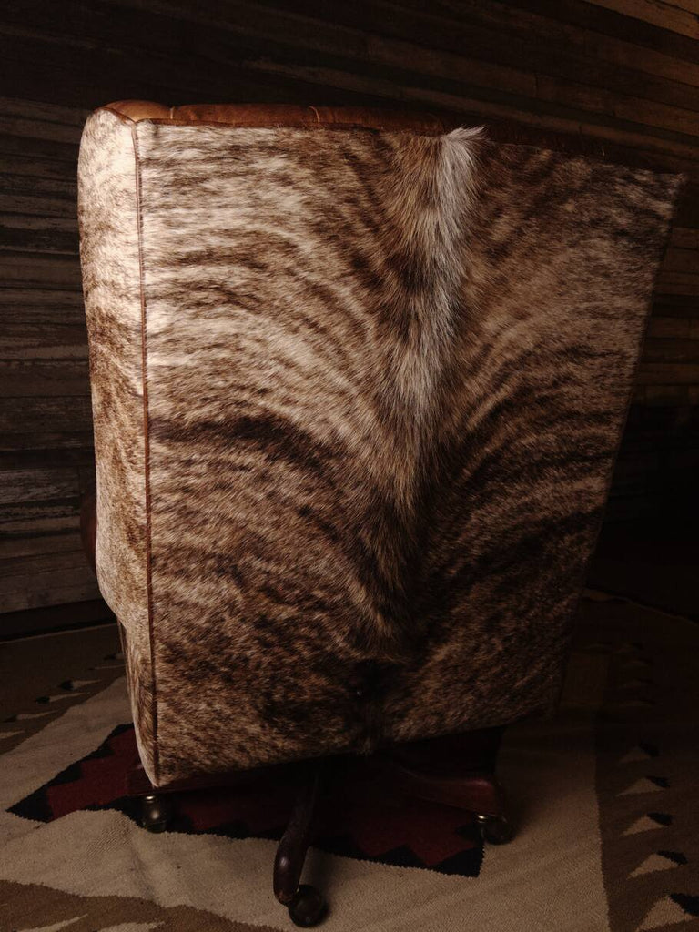 Rear view of the Honcho Executive Chair featuring the light exotic brindle cowhide covering the entire backrest.