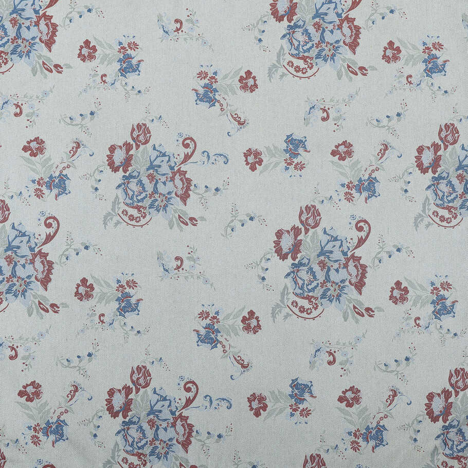 Detailed view of the floral design in rich hues on the Isabelle Washed Denim Bedding Set.