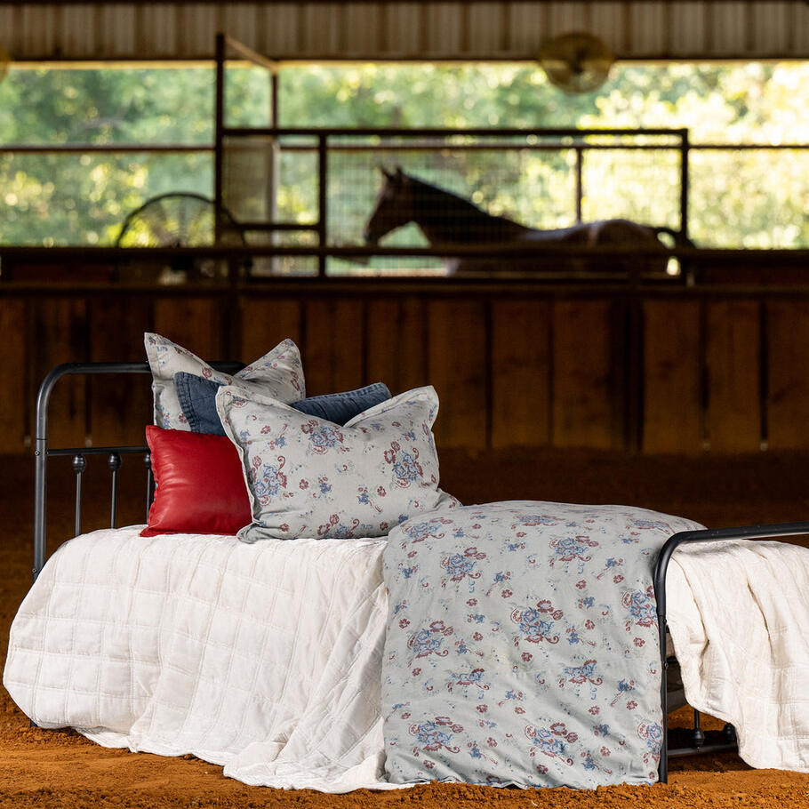 Decorative throw pillow from the Isabelle Collection with coordinating floral motifs.