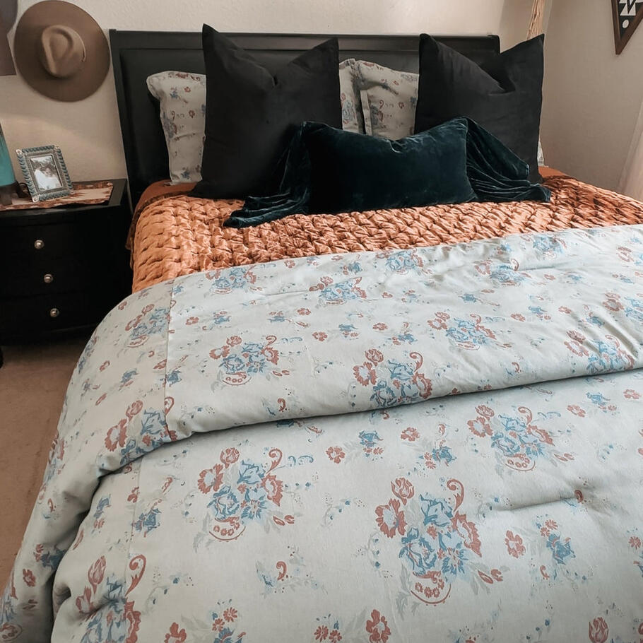 King-sized Isabelle Washed Denim Bedding Set showcasing intricate floral designs on a washed denim fabric.
