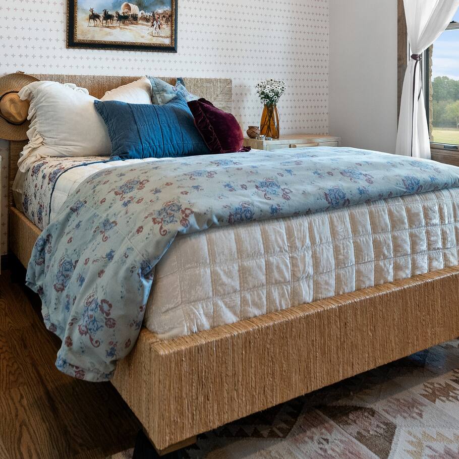 Side perspective of the Isabelle Washed Denim Bedding Set highlighting its plush texture.