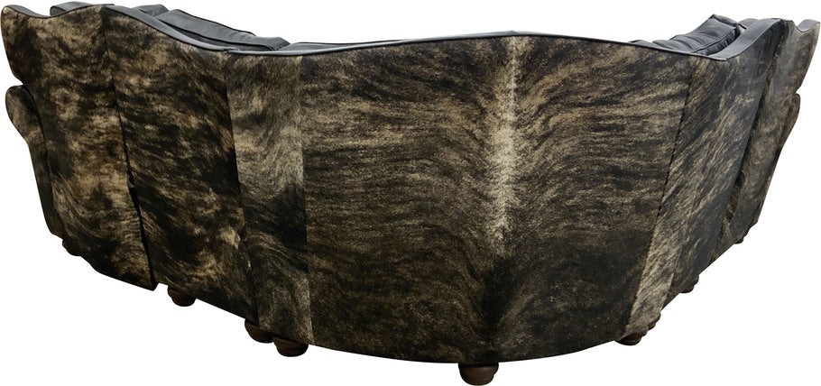 Walkabout Croc accent leather and medium exotic cowhide wrapping around the arms and back of the Jet Black Double Reclining Sectional Sofa.