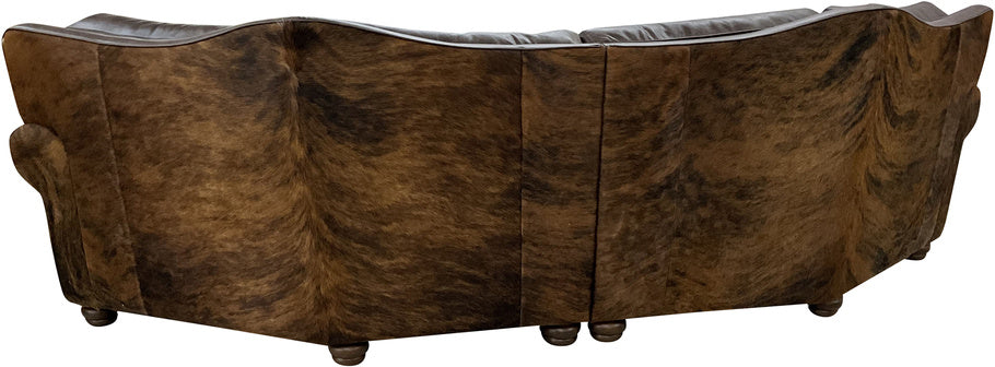 Rear view of the Kings Canyon Curved Sectional wrapped in dark brindle cowhide, blending rustic charm with modern sophistication.