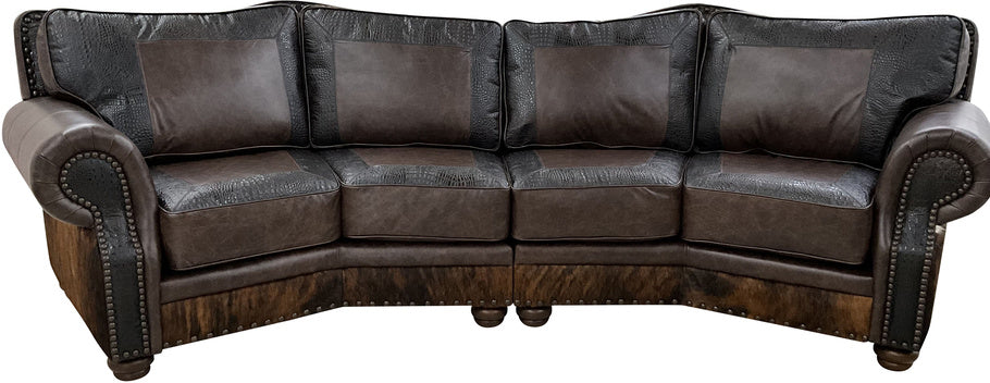 A luxurious Kings Canyon Curved Sectional featuring rich Jupiter Truffle leather, Walkabout Croc Vintage Black accents, and exotic brindle cowhide on the arms and back.