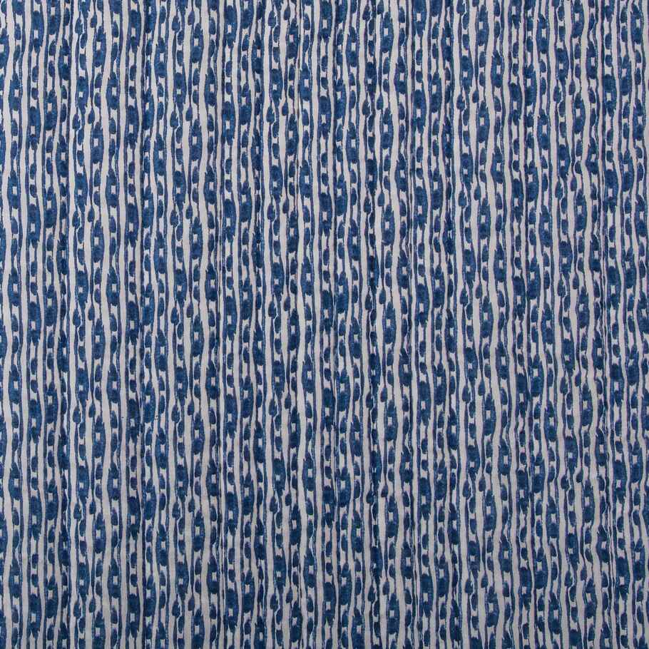 Detailed view highlighting the soft, yarn-dyed blue watercolor wave design on the Legato Quilt, capturing the essence of tranquil ocean movements.