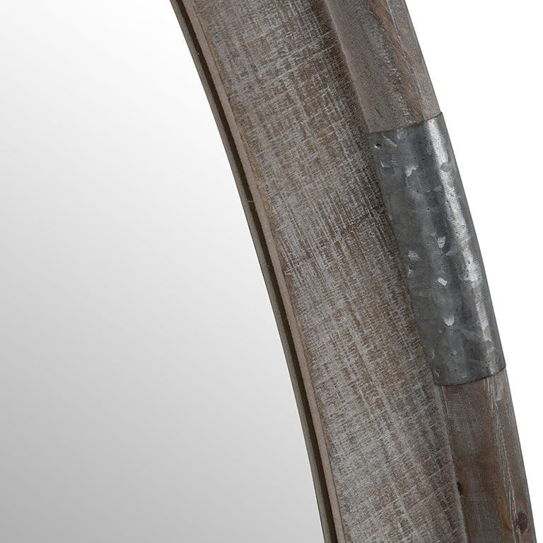 Close-up of a wooden object with a metal band on a white background