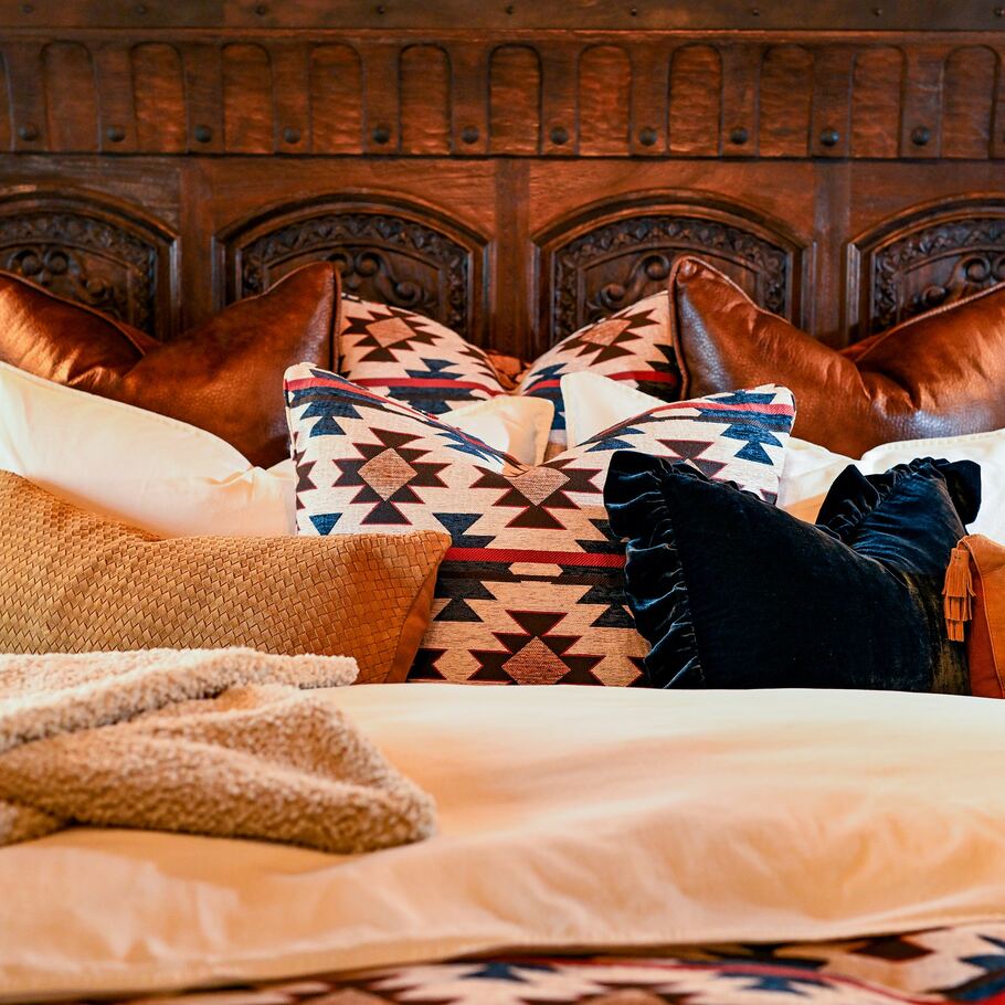 Marina Chenille Bedding Set adorned with coordinating decorative throw pillows for added style.