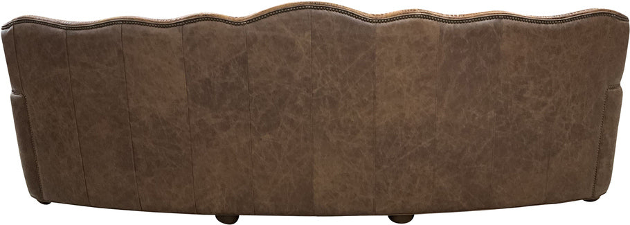Close-up of the Marshland Curved Sofa’s diamond-tufted back, highlighting the craftsmanship and refined elegance of this Western-inspired piece.