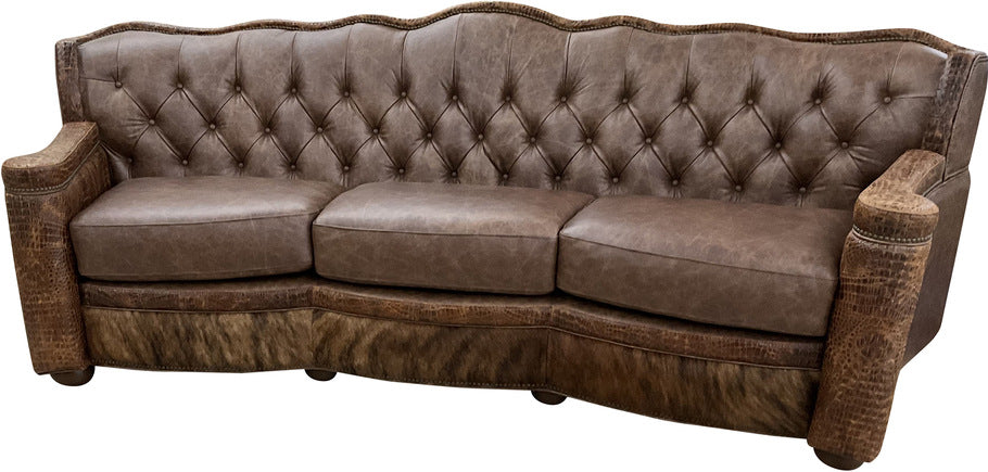 Front view of the Marshland Curved Sofa, featuring Palio Cafe leather upholstery, a diamond-tufted inback, and elegant Gator Hornback Rustic Cognac accent leather.