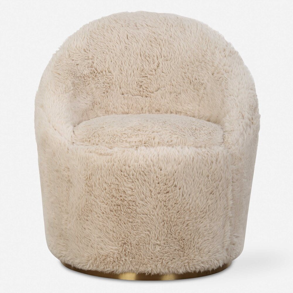 Modern swivel chair upholstered in long-haired caramel faux sheepskin with a plated brass base.