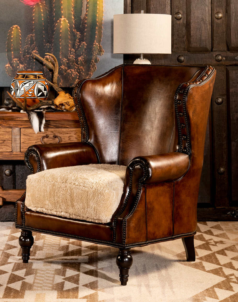 Montana Leather Chair showcasing its hand-burnished full grain leather upholstery and premium shearling hide seat cushion.