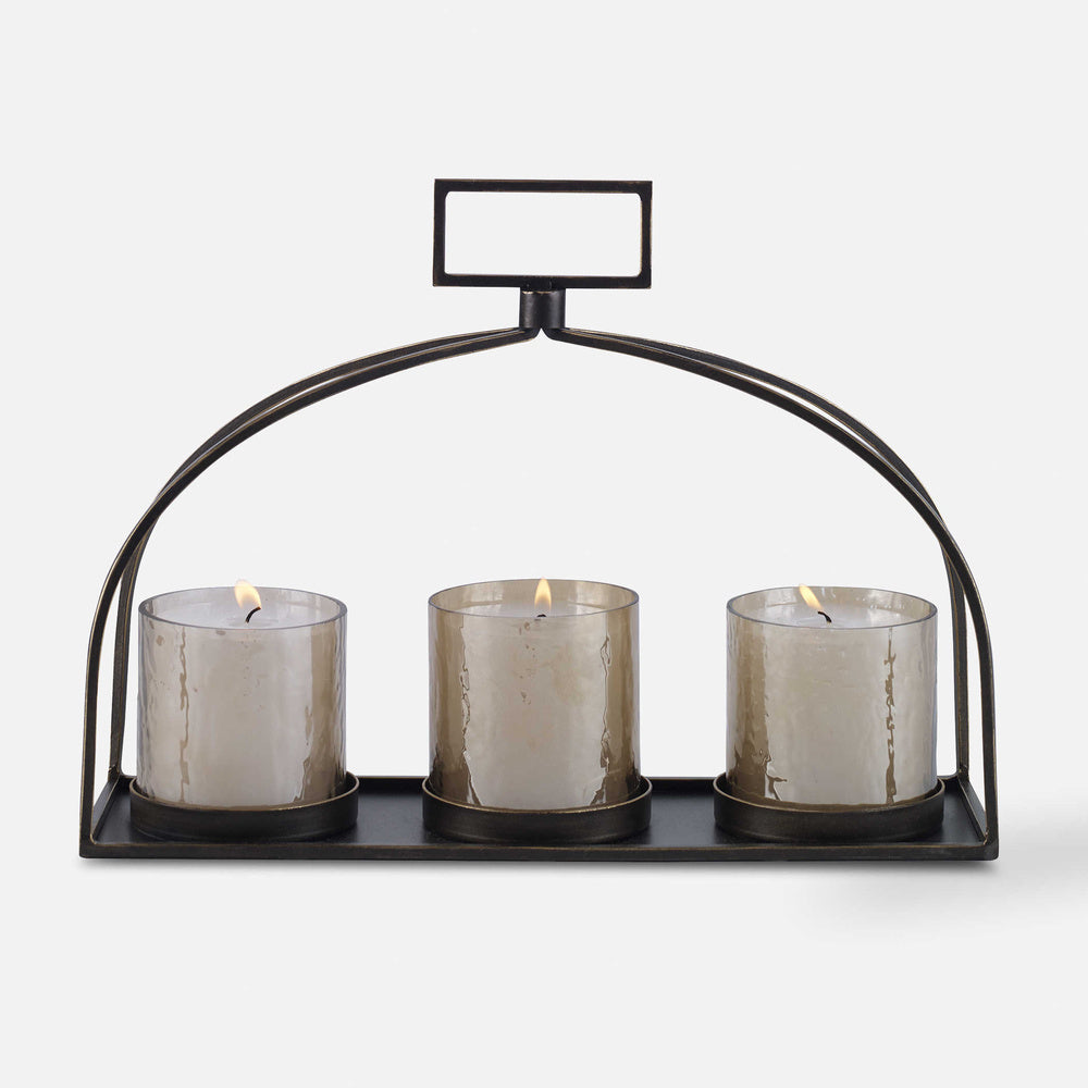 Trio of 3"x3" white candles placed inside the decorative glass hurricane.