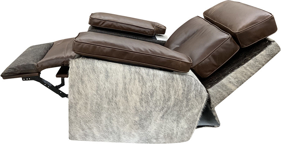 Side view of the Musician's Rocker Recliner in a fully reclined position, showcasing Cowboy Bourbon leather cushions, light exotic cowhide upholstery, and sturdy reclining mechanics for ultimate comfort and style.
