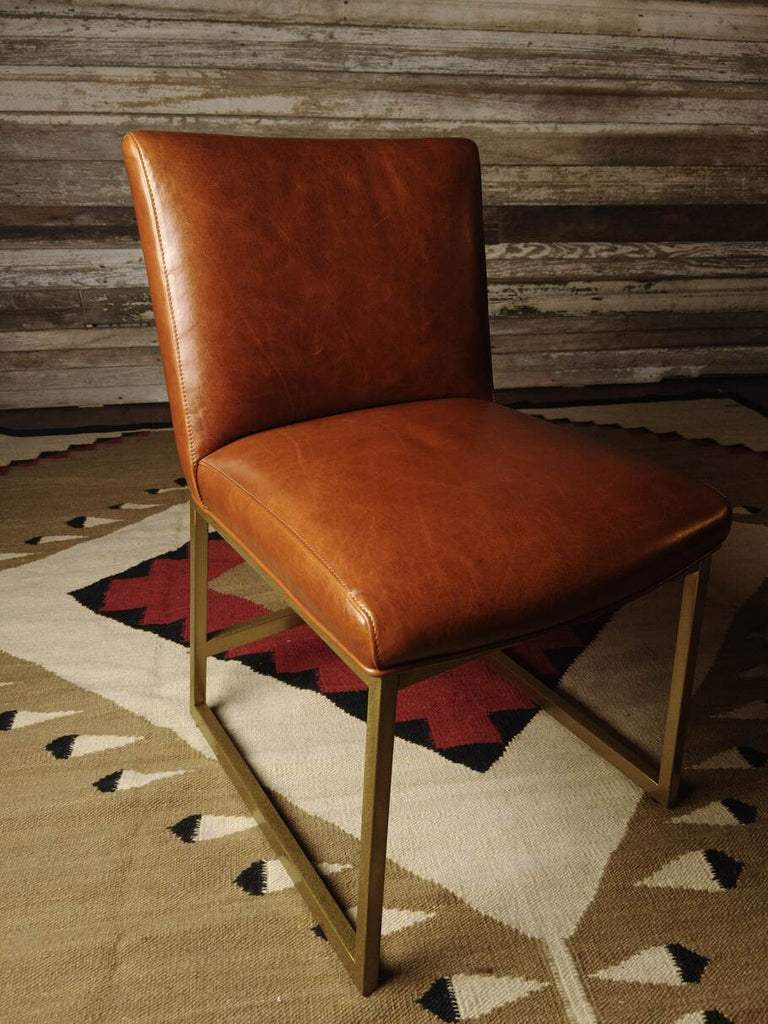 Angled view of the Napa Valley Dining Chair, displaying its contemporary Western flair and minimalist aesthetic.