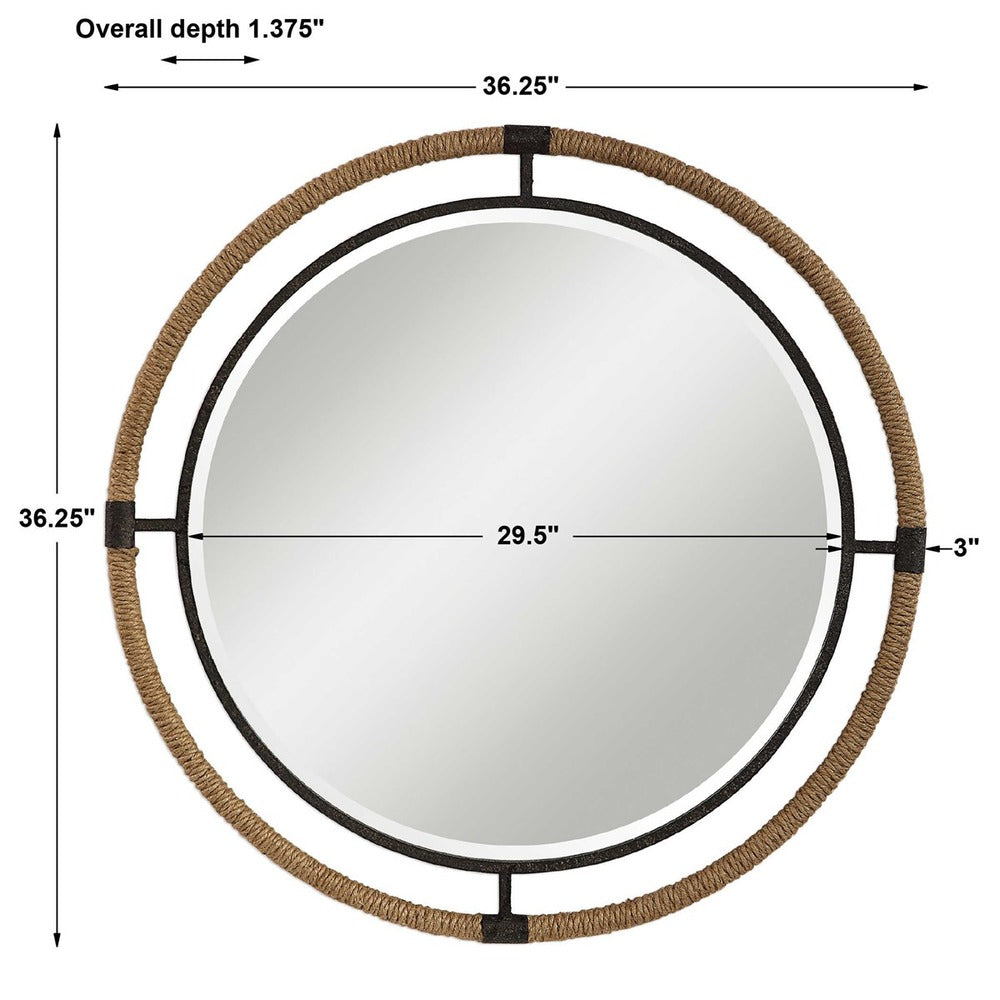 Elegant coastal mirror featuring a round design, beveled glass, natural rope accents, and a textured rust black forged iron frame.
