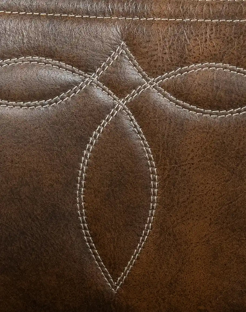 Close-up image of the top-grain leather upholstery, hand-antiqued for a unique and vintage look.