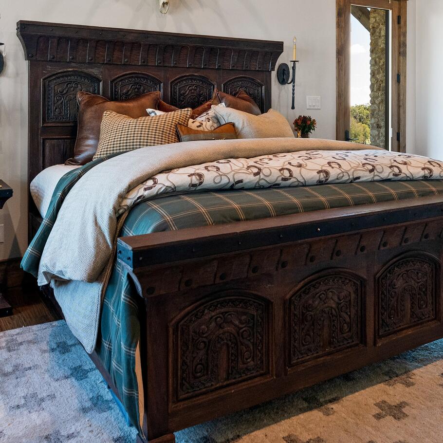 Side angle of the Prieto Equestrian Bedding Set on a bed, highlighting the comforter's drape and the coordinating pillow shams.