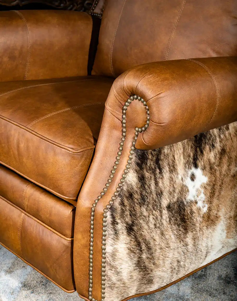 Comfortable and supportive seat cushion with premium leather on the Rancher Brindle Recliner.