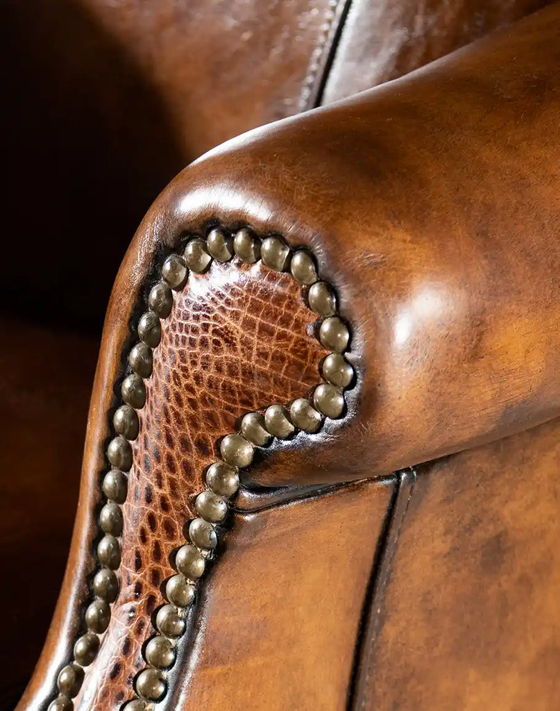 Close-up image of the nailhead detailing on the Rancher Executive Desk Chair, emphasizing its sophisticated craftsmanship.