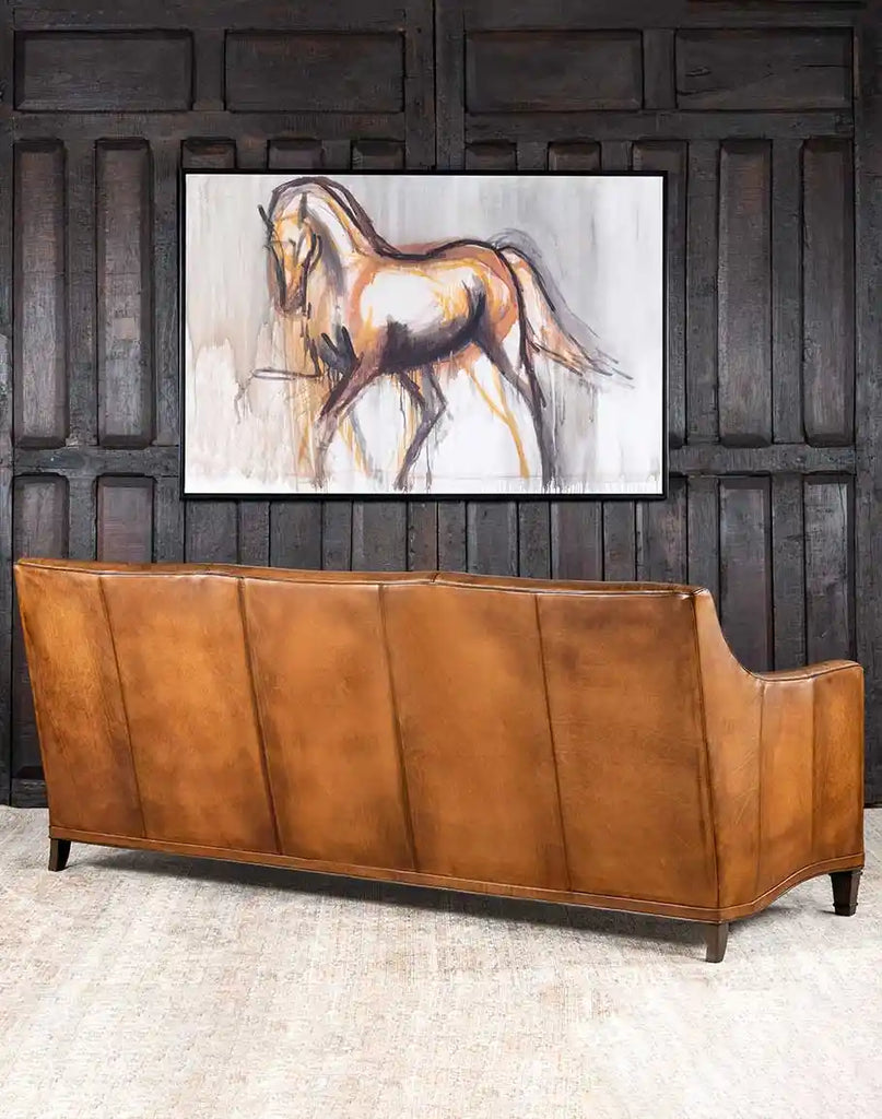 Back view of the Rudy Saddle Leather Sofa displaying its tight seat back and clean lines.