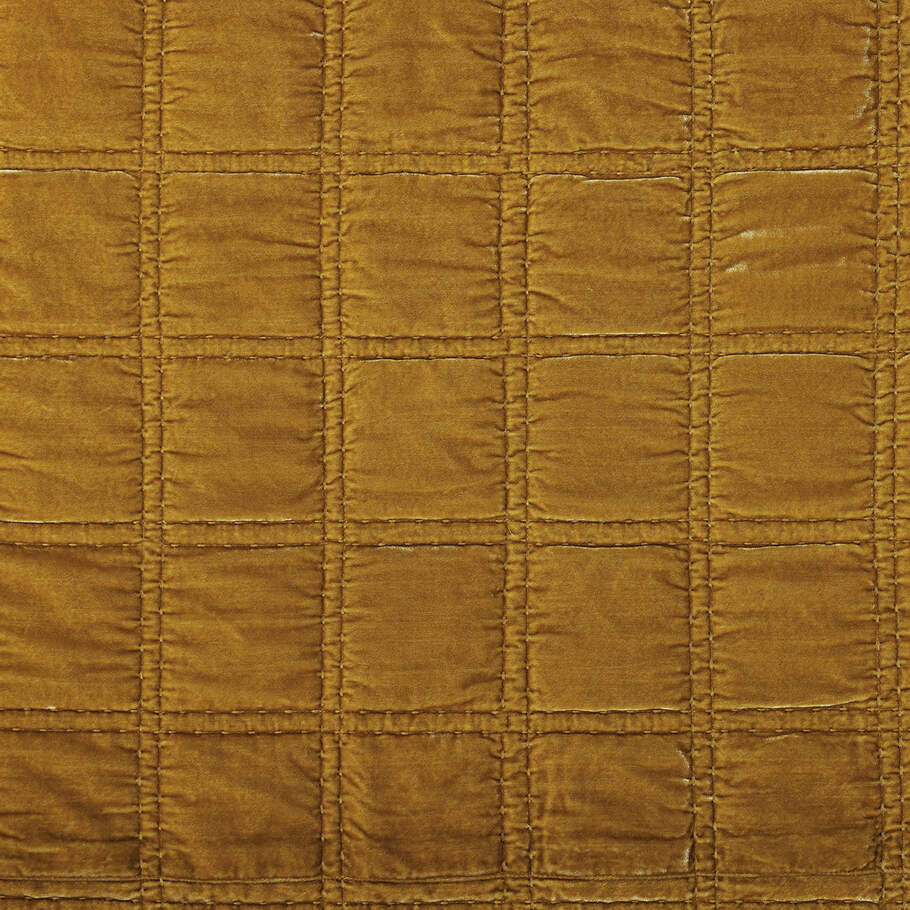 Detailed view highlighting the intricate double box stitch quilting on the Saffron Faux Silk Velvet Quilt, enhancing texture and depth.