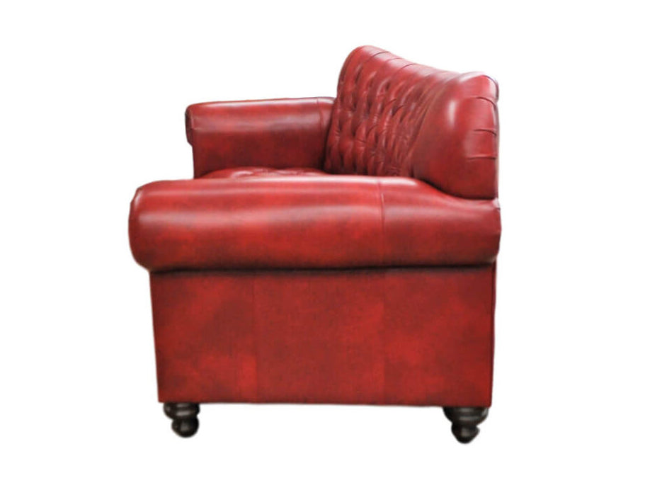 Second side of red leather conversational sofa on a white background