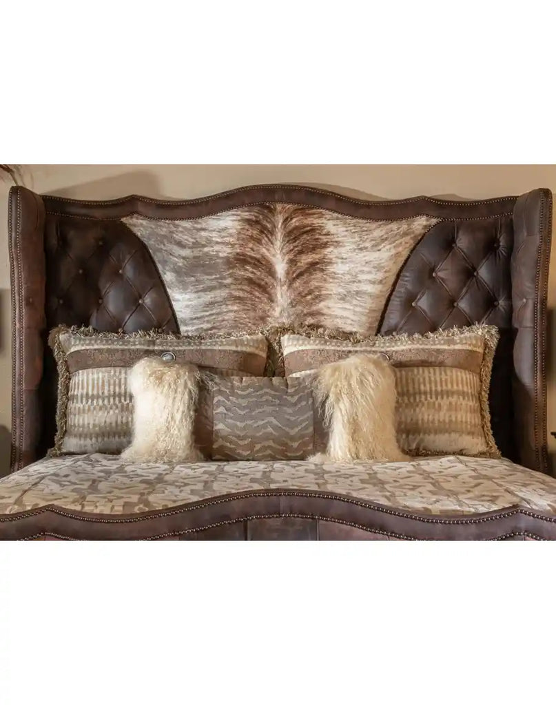 Detailed view of the hand-finished full-grain Italian leather and brindle cowhide on the Sogni De Oro Italian Bed, emphasizing its premium quality.
