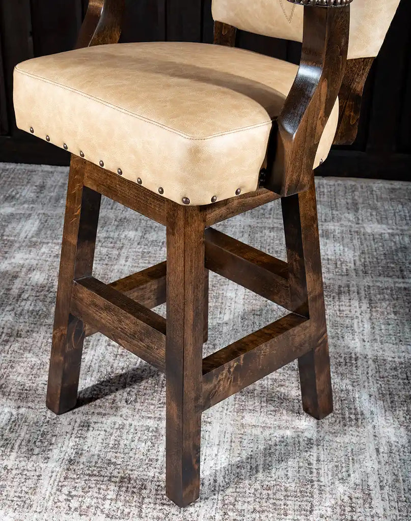 Highlight of the Chisum TX Paraluman Barstool's alder wood base with a luxurious black walnut stain.
