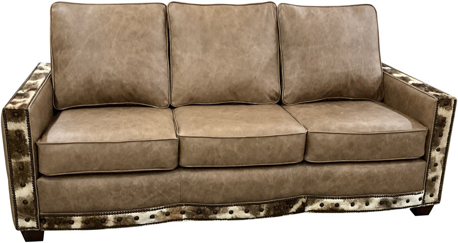 A full front view of the Spaulding Giraffe Sofa, showcasing Palio Camel leather upholstery with luxurious Giraffe hide accents on the backrest, front posts, and bottom rail.