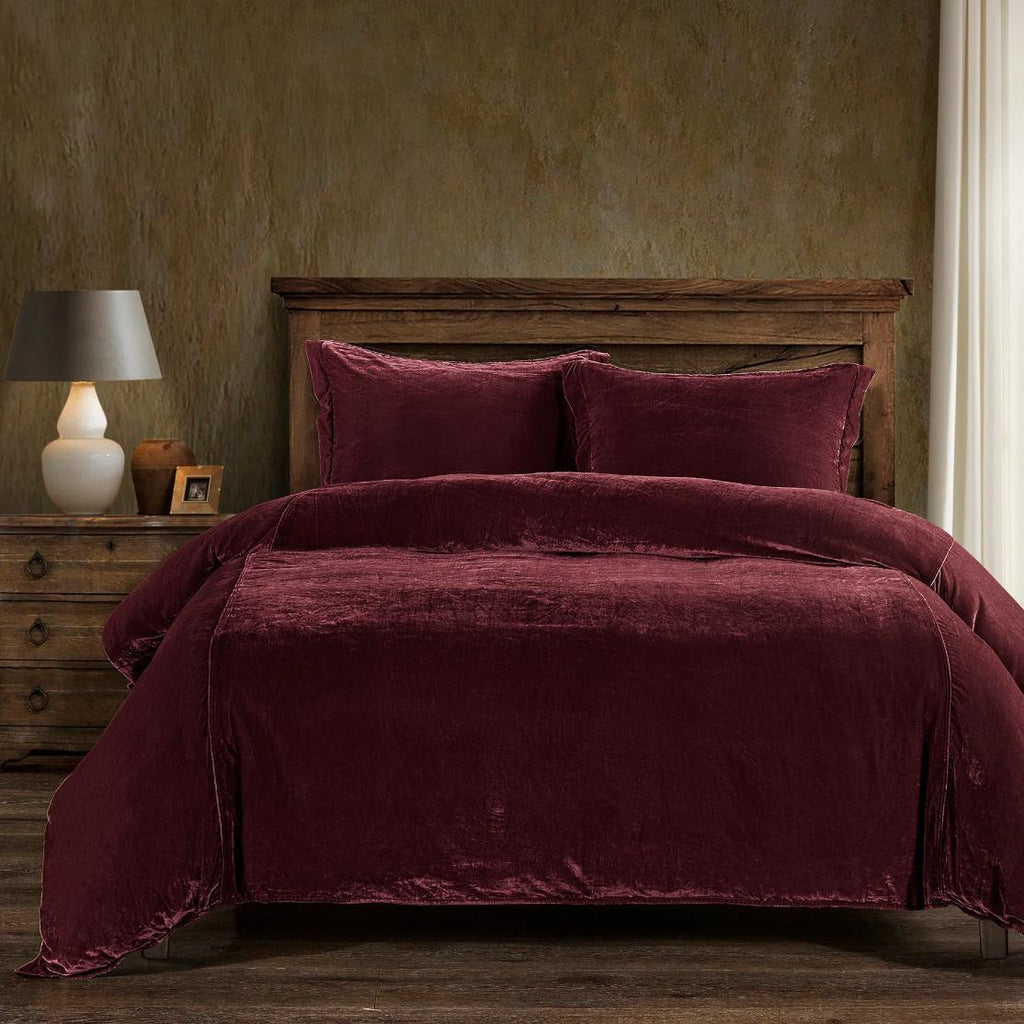 Stella Garnet Red Faux Silk Velvet Duvet Cover Set, featuring a luxurious faux silk velvet texture with a soft sheen, complemented by matching pillow shams.