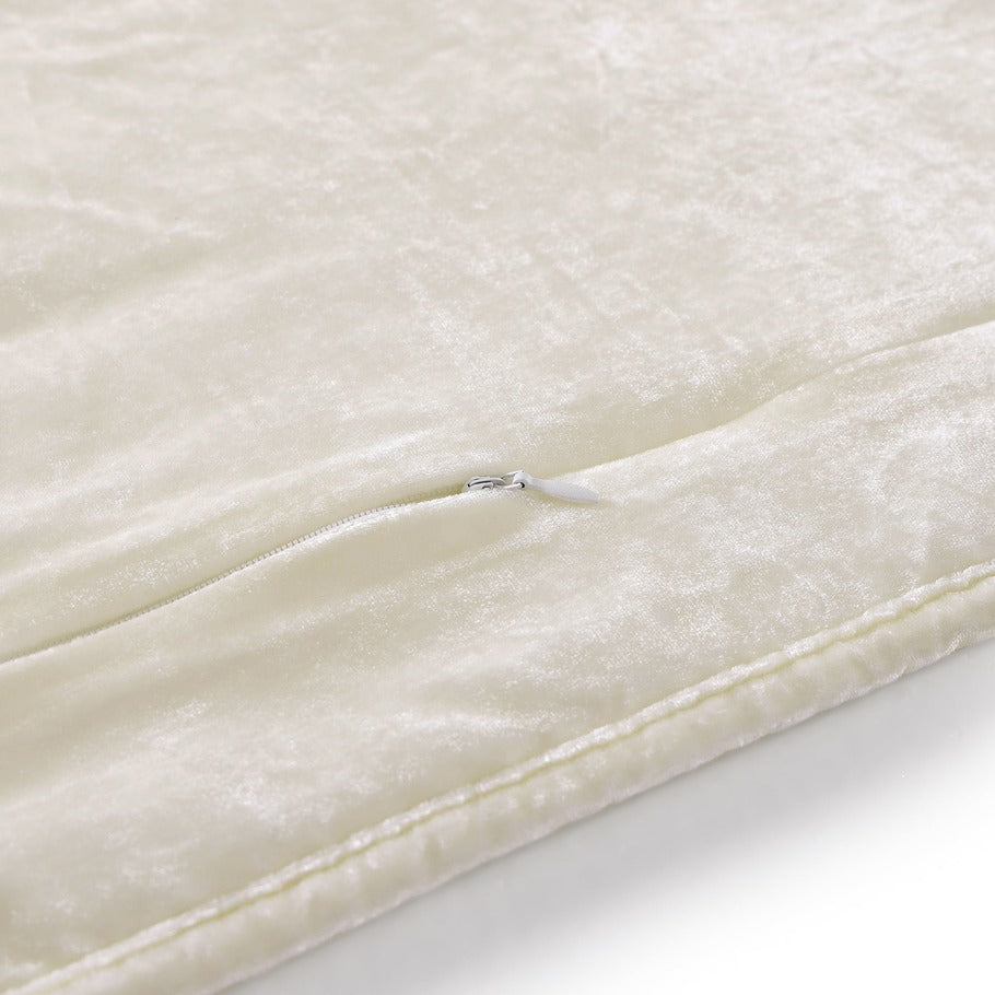 Close-up showcasing the smooth, faux silk velvet fabric of the Stone Quilt, offering a luxurious feel and subtle sheen.​