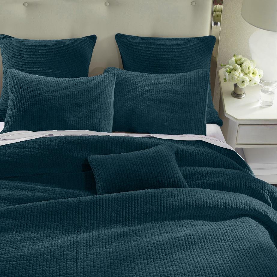 Stonewashed Deep Blue Cotton Velvet Quilt Set, featuring soft cotton velvet fabric with channel quilting, displayed on a bed with matching pillow shams.