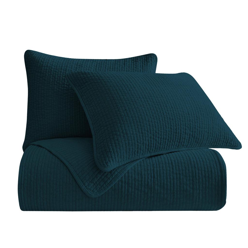 Pair of Stonewashed Deep Blue Cotton Velvet Pillow Shams, featuring matching channel quilting and soft velvet fabric.