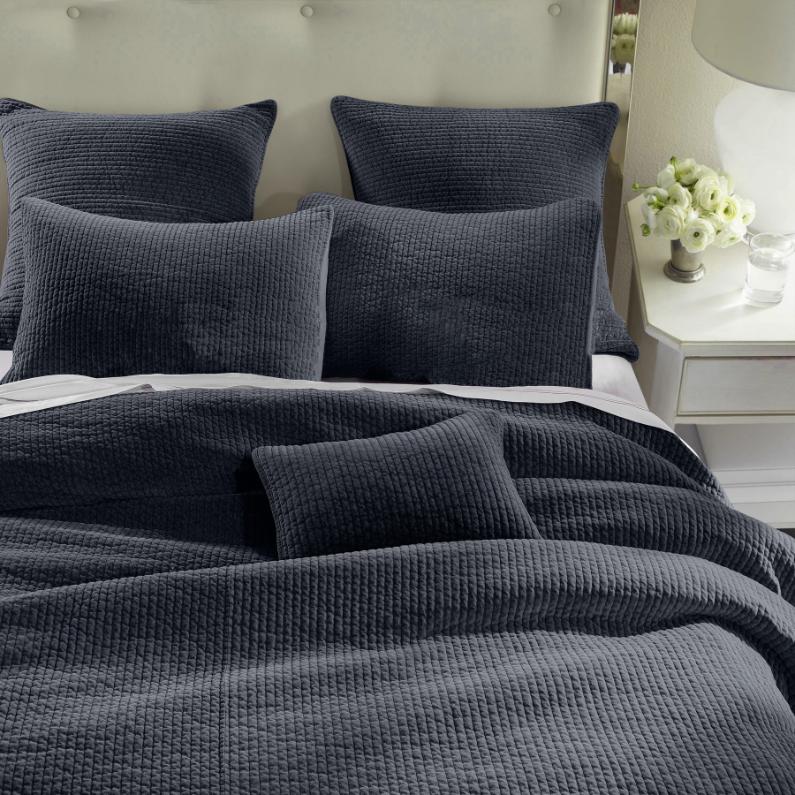Stonewashed Navy Cotton Velvet Quilt Set, featuring soft cotton velvet fabric with channel quilting, displayed on a bed with matching pillow shams