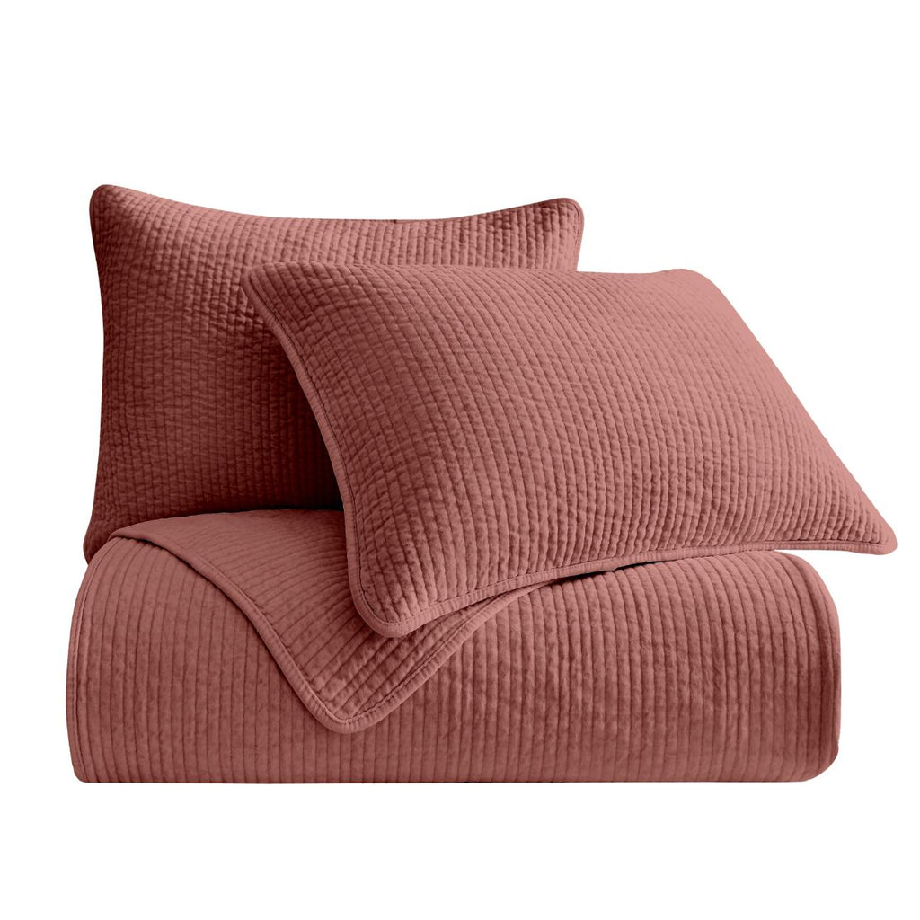 Pair of Stonewashed Salmon Cotton Velvet Pillow Shams, featuring matching channel quilting and soft velvet fabric.