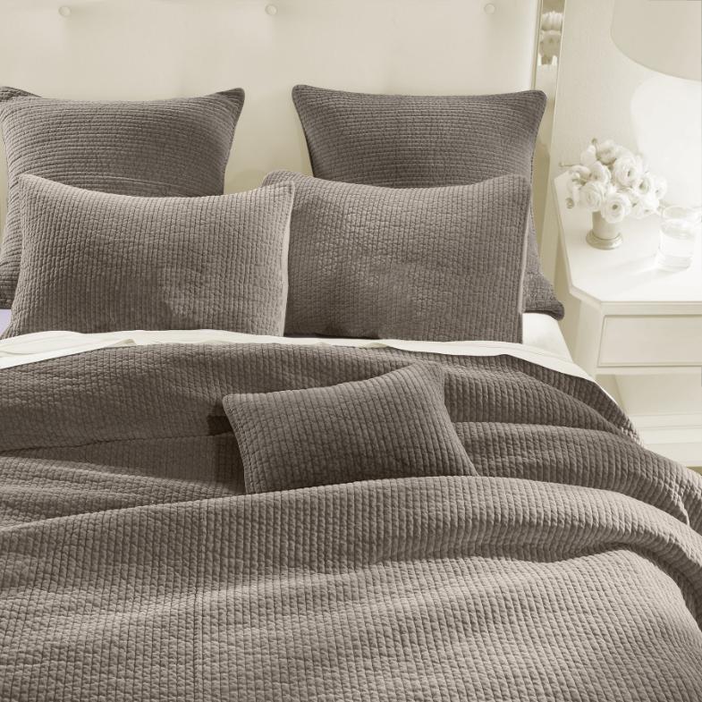 Stonewashed Taupe Cotton Velvet Quilt Set, featuring soft cotton velvet fabric with channel quilting, displayed on a bed with matching pillow shams