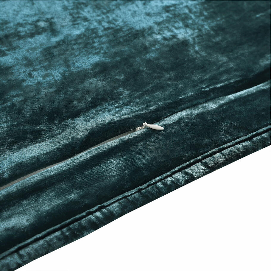 Close-up showcasing the smooth, faux silk velvet fabric of the Storm Blue Quilt, offering a luxurious feel and subtle sheen.