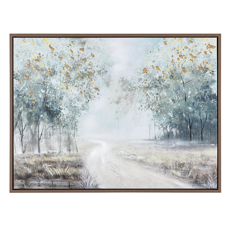 Framed artwork of a misty forest scene with gold accents