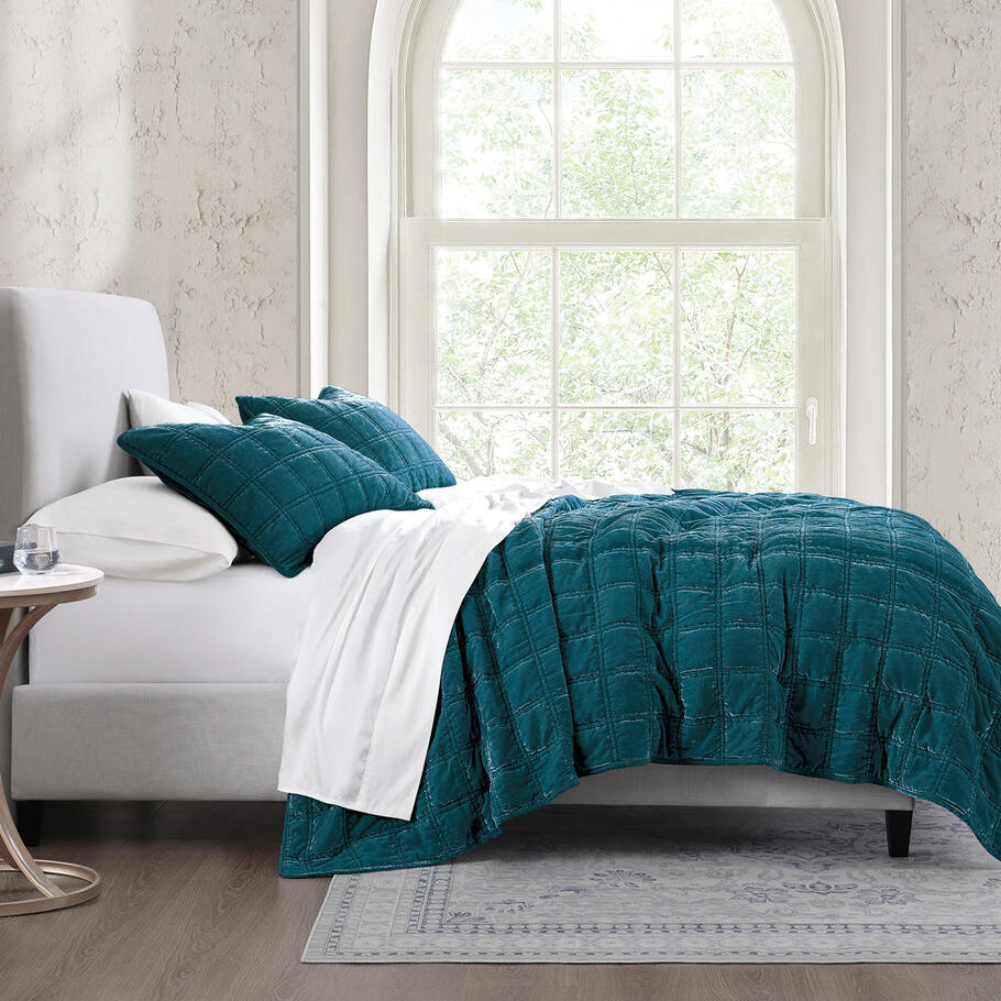 Teal Faux Silk Velvet Quilt Set styled in a contemporary bedroom, complementing neutral tones and minimalist décor.