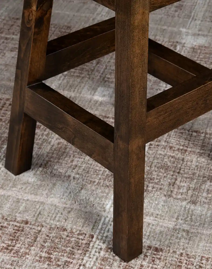 Close-up of the wooden footrest on the Texas Ivory Croc Armless Barstool, designed for both comfort and style.