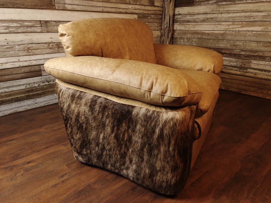 Close-up image focusing on the armrest and the intricate stitching of the Longhorn Oatmeal leather upholstery on the Texas Longhorn Recliner.